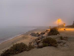 Fog and shoreline at Morro Rock